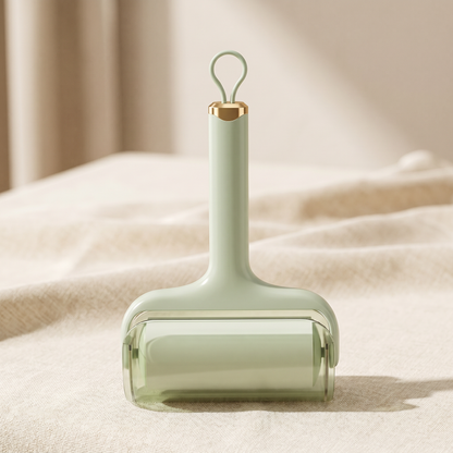 Light green Pawfect Sticky Pet Hair Roller with gold handle on a neutral background